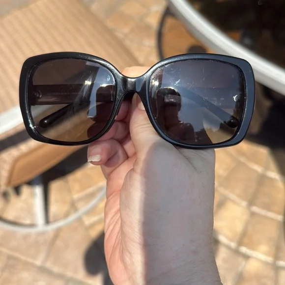 Burberry black lens sunglasses with nova check print on both sides
